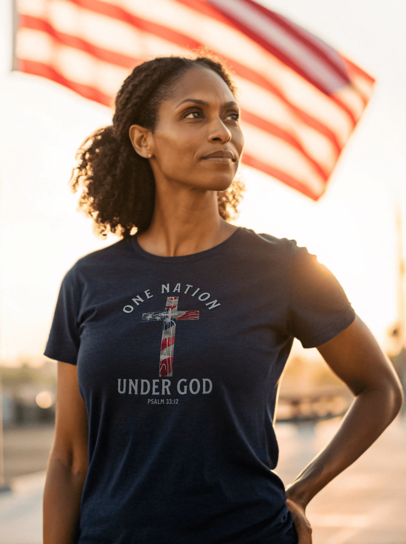 Christian patriotic One Nation Under God Bella Canvas 3001 shirt featuring American flag cross design and Psalm 33:12 scripture